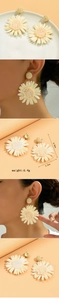 Bohemian daisy straw earrings detailed with 6.8cm length and 5.0cm width specifications