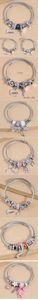 Vue détaillée du bracelet à breloques arc-en-ciel avec des indications de dimensions