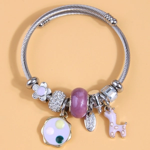 Silver woven wire charm bracelet with purple floral pendants and cartoon giraffe charm