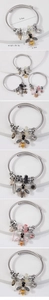 Detailed view of silver twist bangle with crystal bee and floral charms, 5.0cm inner diameter