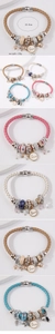 Detail of multi-element beaded leather cord bracelets with magnetic clasp and love charm