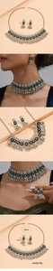Detail view of retro silver jewelry set with floral patterns and dimension measurements