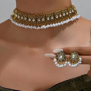 Parure collier et boucles d'oreilles vintage avec ailes de paon et perles blanches