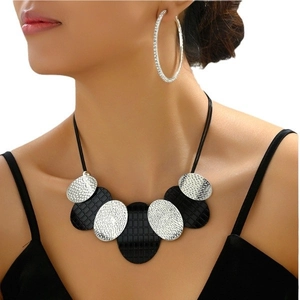 Fashion jewelry set with oval pendant necklace and large silver hoop earrings for women