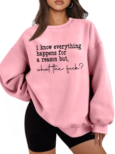 Detail of pink thick sweatshirt with black printed slogan i know everything happens