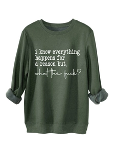 Detail of dark green fleece sweatshirt showing ribbed collar and white text print
