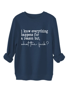 Detail of navy crewneck sweatshirt showing white typography text and ribbed cuffs
