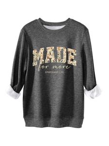 Detail of fleece lining and floral art print on dark grey Ephesians sweatshirt