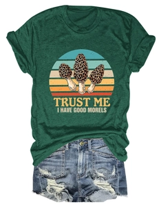 Flat lay of green cotton t-shirt with morel print and distressed denim shorts set