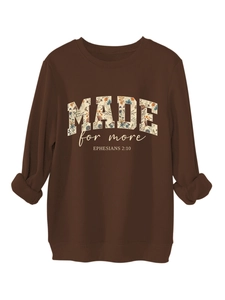 Detail of dark brown sweatshirt with floral lettering and Ephesians 2:10 graphic print