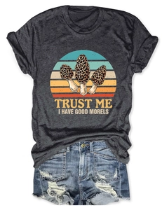 Detailed flat lay of women's grey t-shirt with morel print and denim shorts outfit
