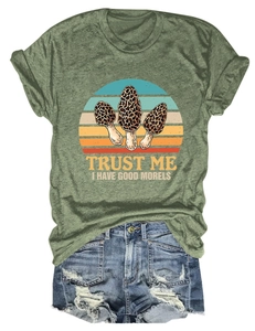 Army green mushroom graphic tee with vintage sunset print and denim shorts set detail