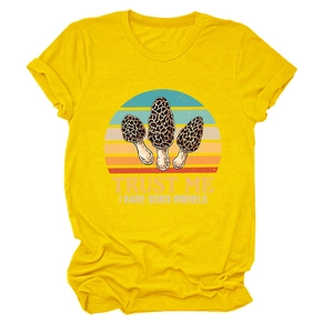 Detail of mushroom print and Trust Me I Have Good Morels text on yellow t-shirt