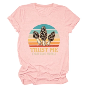 Detail of pink cotton T-shirt featuring vintage mushroom print and witty typography