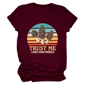 Detail of burgundy T-shirt showing retro morel mushroom graphic and funny text slogan