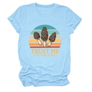 Detail of light blue crew neck T-shirt featuring retro morel mushroom print and funny slogan