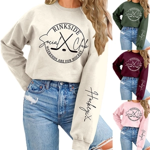 Detail view of four colors of the Rinkside Social Club hockey print sweatshirts