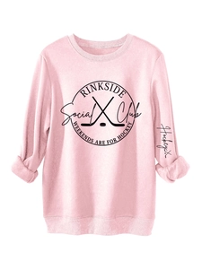 Pink oversized sweatshirt detail with Rinkside Social Club hockey graphic and ribbed cuffs