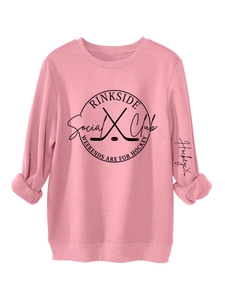 Detail of pink crewneck sweatshirt with Rinkside Social Club hockey print and ribbed cuffs