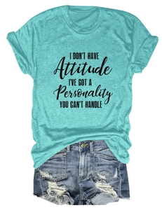 Flat lay of lake blue t-shirt with personality slogan and distressed denim shorts