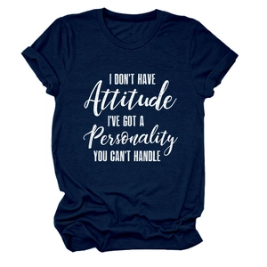 Close-up of navy blue cotton t-shirt with white printed slogan and rolled cuffs detail