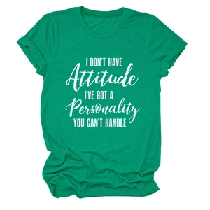 Detail of green cotton T-shirt featuring rolled cuffs and white artistic slogan print
