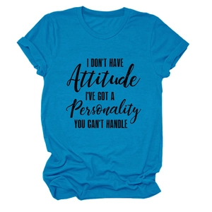 Close-up of rolled cuffs and black slogan print on blue cotton blend t-shirt