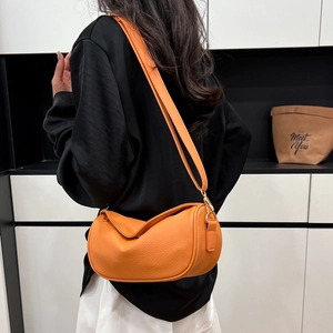 Orange lychee pattern dumpling shoulder bag with minimalist soft leather for women