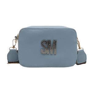 Light blue square crossbody bag with sparkling SM logo and ethnic style wide strap