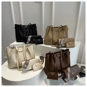 Detailed set of crocodile embossed handbags including tote and crossbody bags in four colors