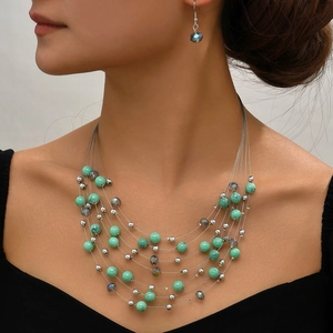 Parure de bijoux bohème multicouche avec collier et boucles d'oreilles en turquoise