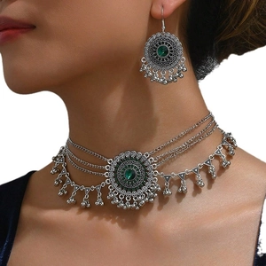 Bohemian multi-layer necklace and earring set with green gems and silver bells