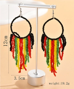 Detailed view of bohemian beaded tassel earrings with 12cm length and 3.5cm width specs