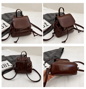 Detail view of coffee brown faux leather mini backpack with drawstring and flap closure