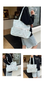 Detail of mint green plaid tote bag with star patterns and multi-pocket structure
