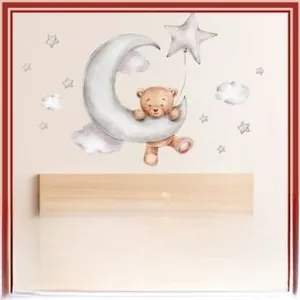 Detailed view of watercolor bear on moon with star balloons wall decal in a nursery
