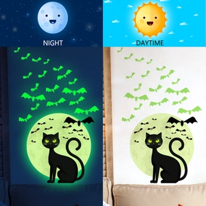 Luminous Halloween wall stickers featuring cats and bats with day and night glow effect