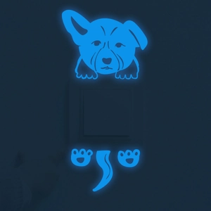 Glow-in-the-dark blue corgi puppy wall sticker detail showing luminous effect on a light switch