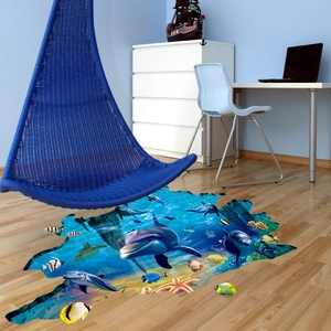 Detailed 3D ocean floor sticker featuring dolphins and coral reef on light wood flooring