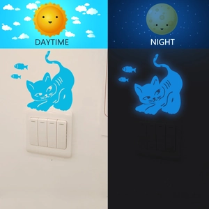 Glow in the dark blue cat and fish wall sticker showing daytime and night effect