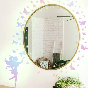 Luminous fairy wall sticker set with butterflies and stars around a mirror