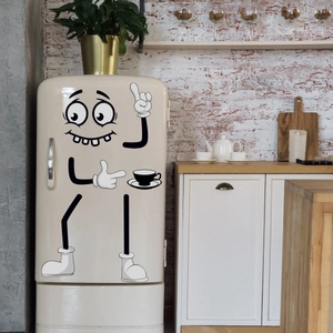 Close-up of a creative cartoon character wall decal on a vintage cream refrigerator