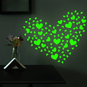 Glow in the dark heart shaped wall stickers in fluorescent green for bedroom decor