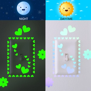 Luminous heart and clover wall stickers showing daytime colors and night glow effect
