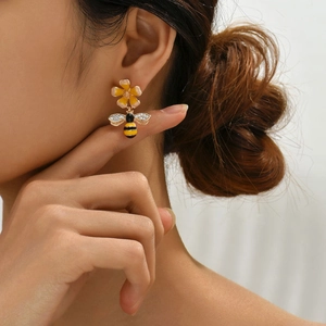 Elegant gold flower and bee stud earrings with yellow enamel and white zircon stones