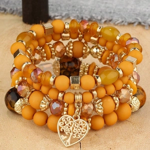 Bracelet multi-rangs bohème avec perles de cristal jaunes et pendentif arbre en cœur