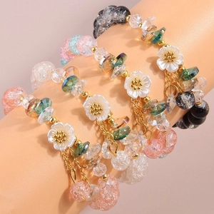 Multilayer beaded bracelet set with flower charms and colorful cracked texture beads