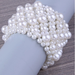 Handmade wide multi-layer pearl stretch bracelet featuring diverse round white pearls