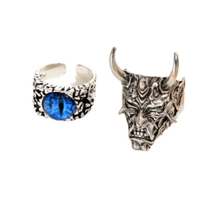 Retro silver rings set featuring blue eye and demon horn designs on white background