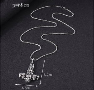 Close-up of vintage skull cross pendant measuring 5.7x3.8cm with a 68cm chain necklace